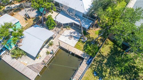 Crystal River House | Honky Tonk Hideaway Ozello sleeps 8 waterfront with docks and historical bar room