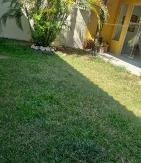 Centro House | Hospedagem Sil e Jean quarto família, cozinha compartilhada com outros hóspedes