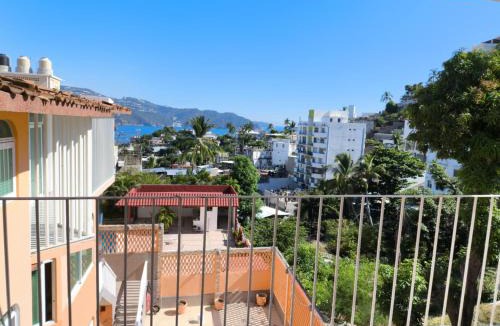 Caleta House | HOSTEL Las Colinas
