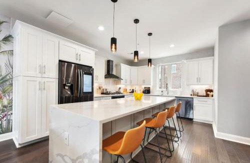 Lower Lawrenceville House | HostWise Stays - The Charlotte - Rooftop patio, Garage Parking, Prime Location, Large 3 Story Home