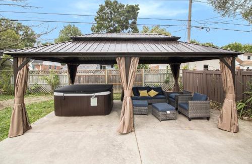 Ann Arbor House | Hot Tub Sauna Fire Pit Outdoor Living Elegant Ranch