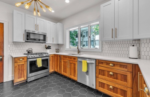 Lower Burns Park House | Hot Tub | Theater | Sauna | Deck | Fire Pit | Walk to Stadium/Downtown/Park