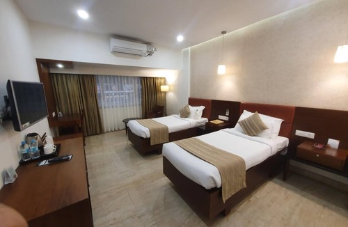 Onamthuruth Hotel | Hotel Aida
