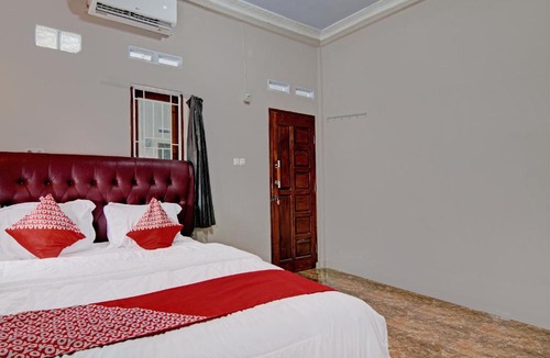Pekanbaru Hotel | Hotel O Putri Homestay Syariah Near SPBU 14.282.694 (Air Hitam)