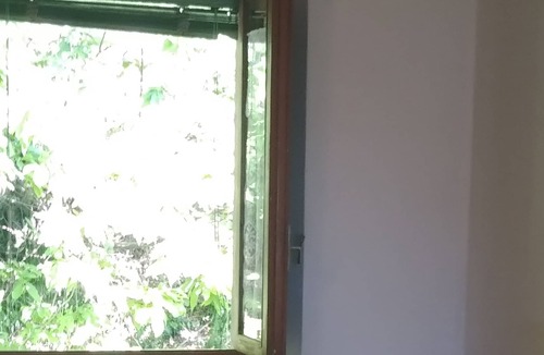 Pariana Apartment | House in a Tuscan village with garden House in a Tuscan village with garden