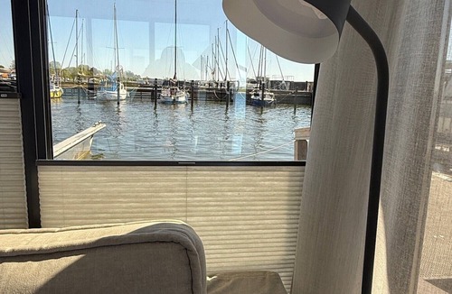 Schleswig Boat Rental | Houseboat Fjord anchorage with bio-sauna and roof terrace in Schleswig