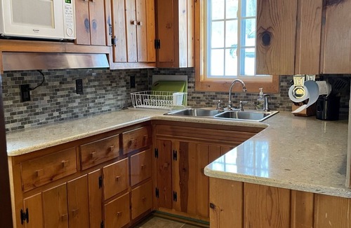 Lincoln Cottage | Hubbard Lake Sunset Hideaway, large lakefront property.