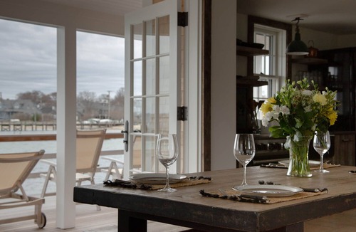Nantucket Town Cottage | Huge private deck on water. In town yet very quiet.
