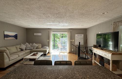High Point House | Humble Hideaway - Inviting lakefront home with firepit, balcony & W/D - dog-friendly