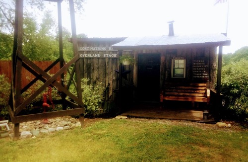 Frontier Cabin | Hunting Cabin Rustic Handcrafted primitive sits in our unique rustic Cowboy Town