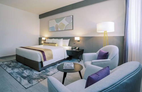 Al Muraqqabat Hotel | Iconic Dubai Views | Steps to Burj Khalifa, Dubai Fountain & Downtown Adventure