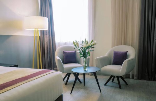 Al Muraqqabat Hotel | Iconic Dubai Views | Steps to Burj Khalifa, Dubai Fountain & Downtown Adventure