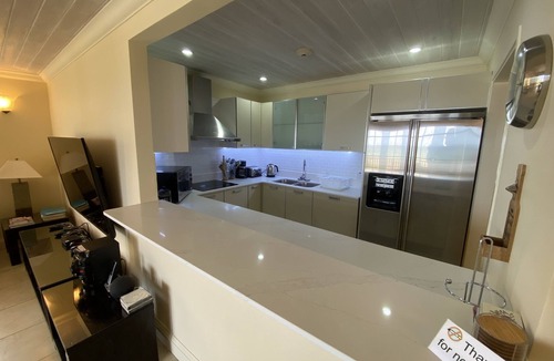 St. Lawrence Gap Apartment | Iconic upscale apartment in St Lawrence Gap with large beachfront balcony
