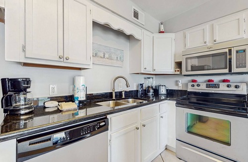 Orange Beach Condo | Ideal beachside getaway on ground floor with 3 pools - walk 600' to sand