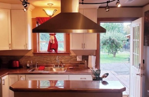 Spokane Valley House | Idyllic Cottage Memory Making with Pool & Outdoor Fireplace under the Gazebo,