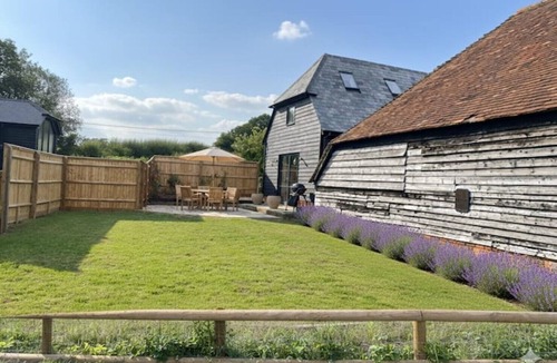 Burghclere House | Idyllic listed converted barn with tennis court perfect for families and friends