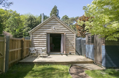 Wareham Cabin | Idyllic Log Cabin with Log-fired Hot Tub nestled in a Forest Clearing
