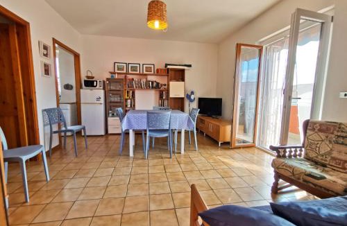 Lido Apartment | Il mare dietro l'angolo, attico con parcheggio privato ad Alghero
