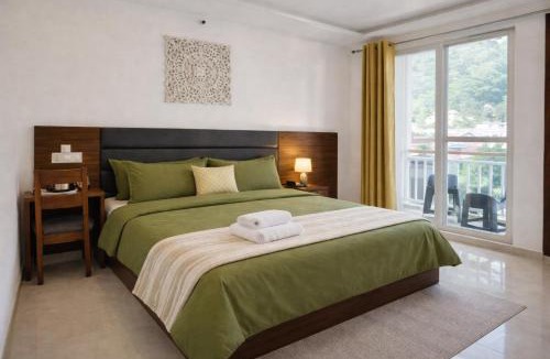 Tapovan Apartment | Ima Ganga Hotel - Aesthetic, Quite Mountain View Rooms In Upper Tapovan with netflix, free airport pickup for 7 or more nights booking