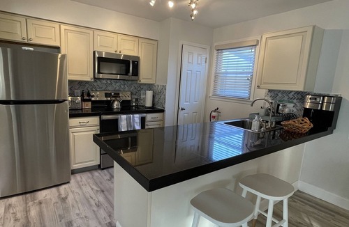 Brigantine Condo | Immaculate Beach Block Condo with Private Yard, Outdoor Shower, & Garage