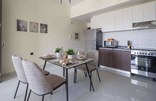 Dubai Apartment | Impressive 1BR with Pool Views in Liwan!