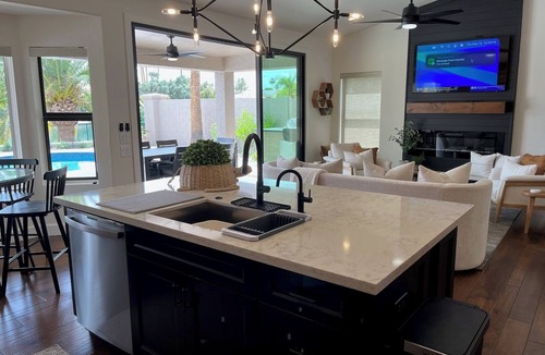 Crystal Shores House | IMPRESSIVE Val Vista Lake front w/VIEW: Heated Pool, Patio TV, Fishing