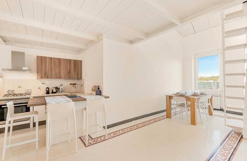 Fezzano Apartment | In the picturesque seaside village of Fezzano, just minutes from La Spezia and Portovenere, lies Casa al Quarto, a spacious and bright apartment on the fourth floor of a typical Ligurian house (no elevator).The apartment can accommodate up to 5 people an