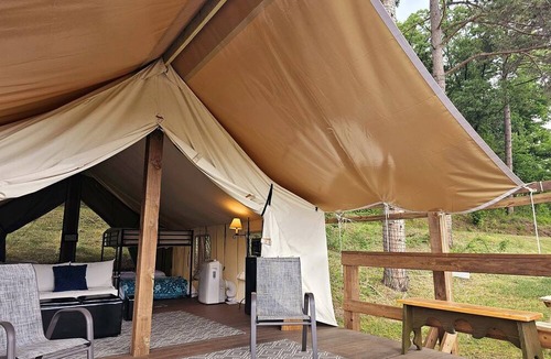 St Croix Falls RV Rental | Incredible Tented Cabin Ideal for Glamping with Fireplace and Barbecue in Saint Croix Falls, Wisconsin