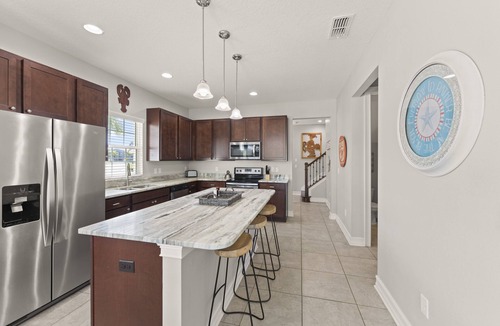 Indian Harbour Beach House | Indian Harbour Beach Townhome with Pool, Game Room, BBQ Grill & Putting Green!