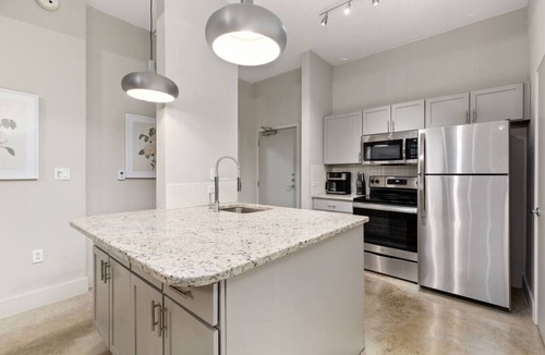 Main - Military Plaza Apartment | Industrial High Rise 1BR Skyline View Roof Pool