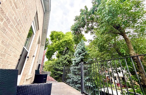 Chicago Apartment | Industrial Loft 2BR + DRUM KIT + Exposed Brick + 2 Private Decks & Lush Backyard
