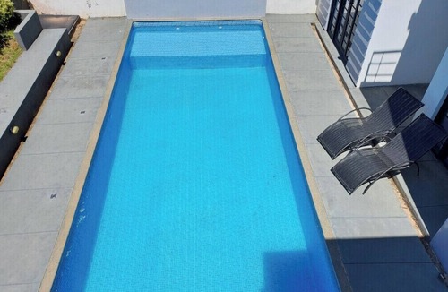 Paruru Cottage | Industrial style country house with 4 suites. Pets allowed. Quiet condominium