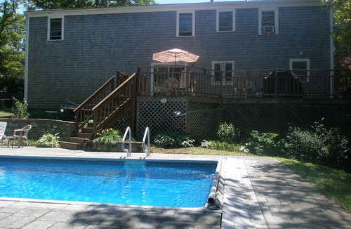 Mashpee House | Inground Pool with patio, large deck, ship playhouse and swing