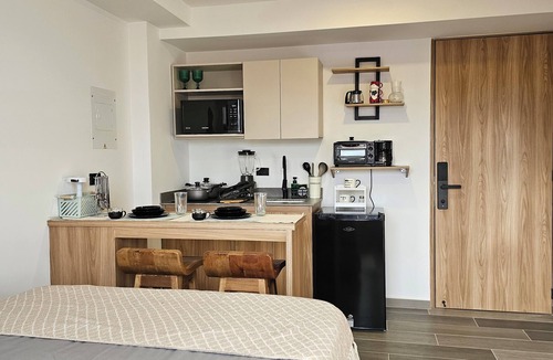 La America Apartment | InnerBloom Your loft in the best neighborhood in Medellín, just 5 minutes from the stadium.