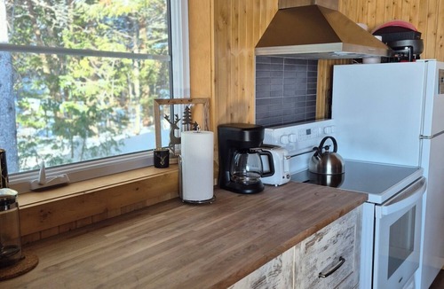 Saint-Marcellin Ski Chalet | Intimate, enchanting lakeside haven with spa. Pets allowed