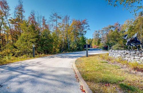 Northport House | Inviting dog-friendly cabin with wooded views, full kitchen & firepit