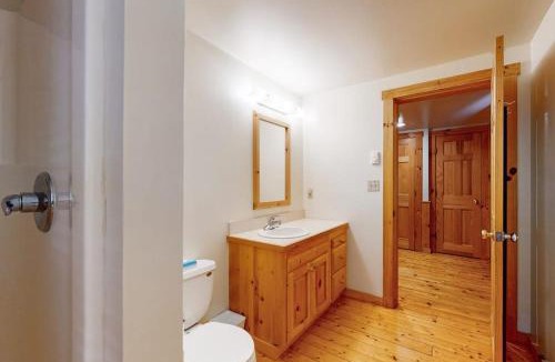 Northport House | Inviting dog-friendly cabin with wooded views, full kitchen & firepit