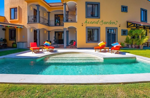 Flamingos House | Inviting dog-friendly home with pool, balcony, patio, & full kitchen