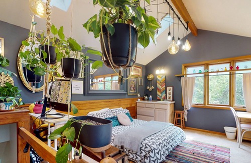 Tigard House | Inviting dog-friendly home with game room, fireplace, balcony, central AC, & W/D