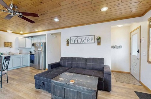 Lake Delton House | Inviting lakefront condo - amazing views, beach access, fireplace, dock, AC, W/D