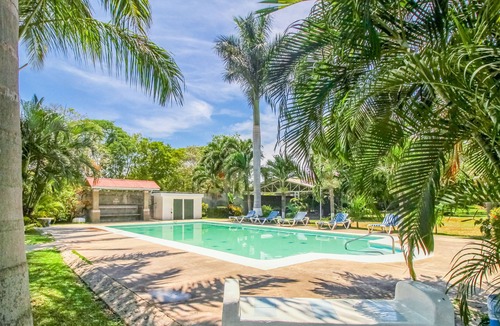 Puntarenas Apartment | Inviting oceanfront villa w/ shared pool, gardens & beach access!