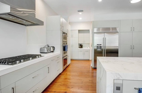 Hunt House | Inviting waterfront home with pool, patio, fireplace, W/D, & dog-friendly