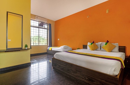 Kushalnagar Hotel | Itsy By Treebo - Aravind Premiere