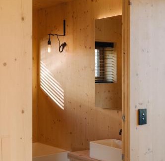Kawarau Falls House | Jacks Point Earth House, Mountain View & Fireplace