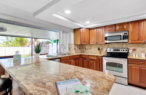 Apollo Beach House | Jamaican Relaxation 3 bedrooms heated pool and unique game room