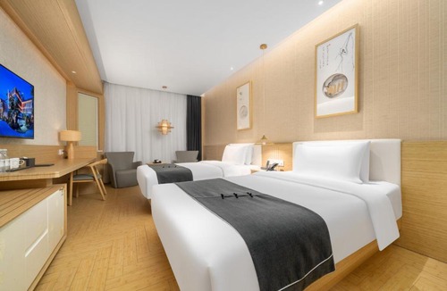 Qianjiang New Town Hotel | Jianguo Puyin Hangzhou Qianjiang New City Sijiqing Qingchun Plaza Store