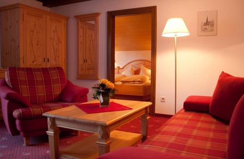 Bad Kleinkirchheim Bed & Breakfast | Junior suite with extra sitting area and balcony - Pension Gertraud