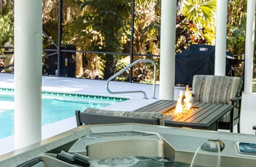 Jupiter Farms House | Jupiter. 2.5 serene and private acres. Surrounded by tropical landscaping.