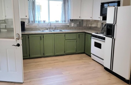 Arnolds Park House | Just steps from The Green Space and Broadway Street. Fantastic Location for All the Fun!