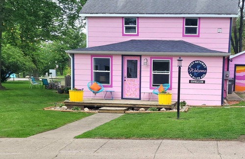 Arnolds Park House | Just steps from The Green Space and Broadway Street. Fantastic Location for All the Fun!
